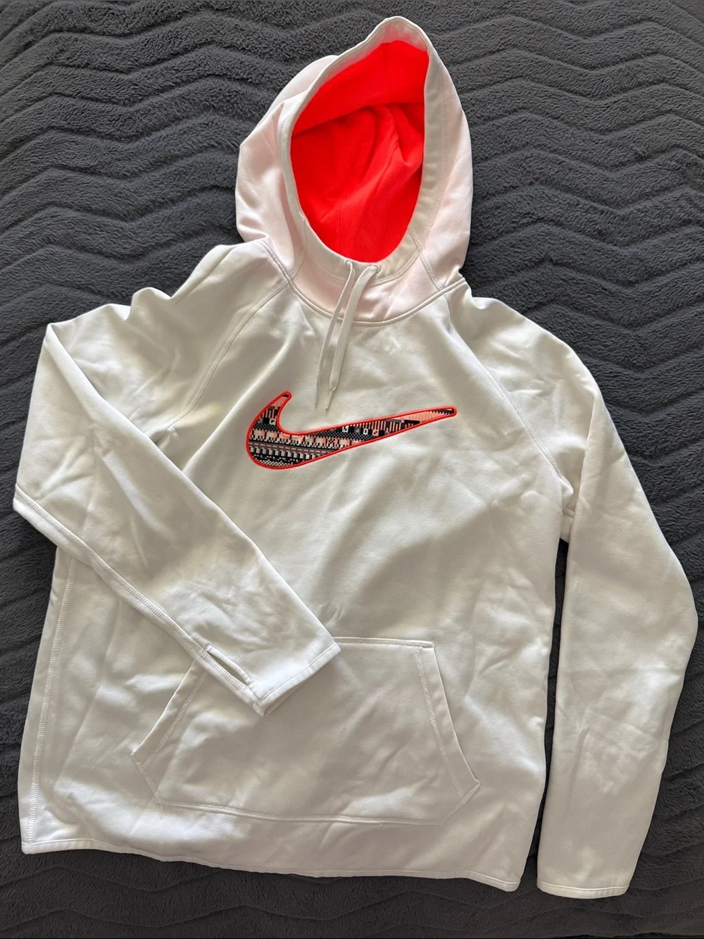 Nike White Sweatshirt with Neon Coral-Outlined Patterned Swoosh